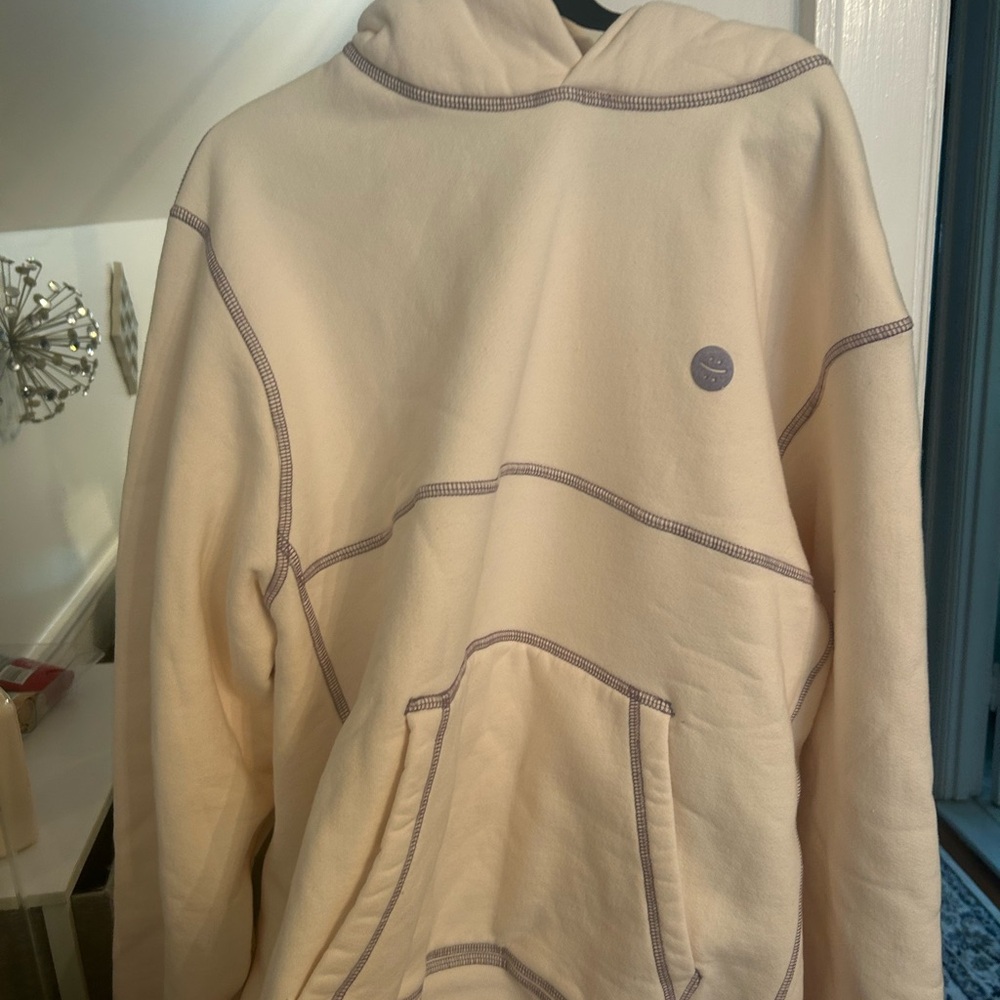Madhappy Cream Hoodie with Purple Stitching